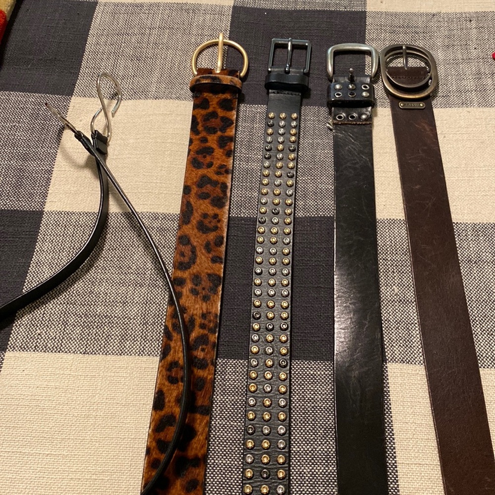 Collection of five belts. Two Fossil, one Express & two CABI.